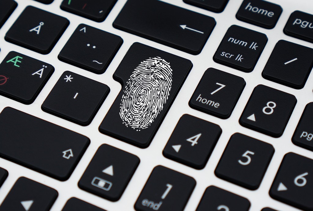 File Sharing Security & IT Recruitment fingerprint on keyboard